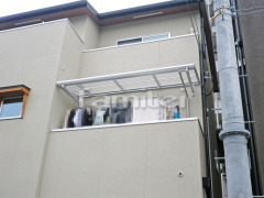 柱なしベランダ屋根 三協メニーウェルA2階 収納式物干し