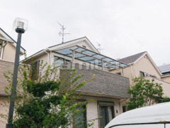 ベランダ屋根 LIXILスピーネ2階 連棟